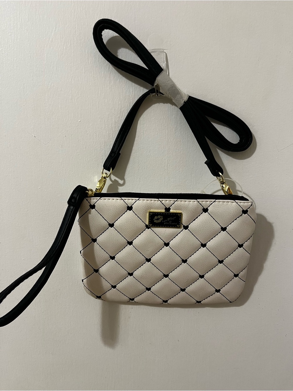 Betsey Johnson Women’s Quilted Crossbody Bag in Cream with Black Trim